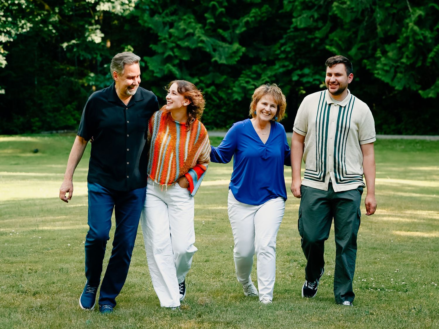 Group of people walking together on grass in casual summer attire, captured in a series of connected photos.