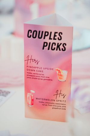 Pink menu cards display cocktail names including 'Watermelon Spritz' and 'Couples Picks' in elegant typography.
