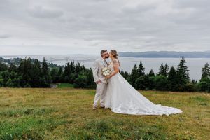 A sequence of romantic wedding photos showing a couple embracing in a scenic mountain meadow with evergreen trees.