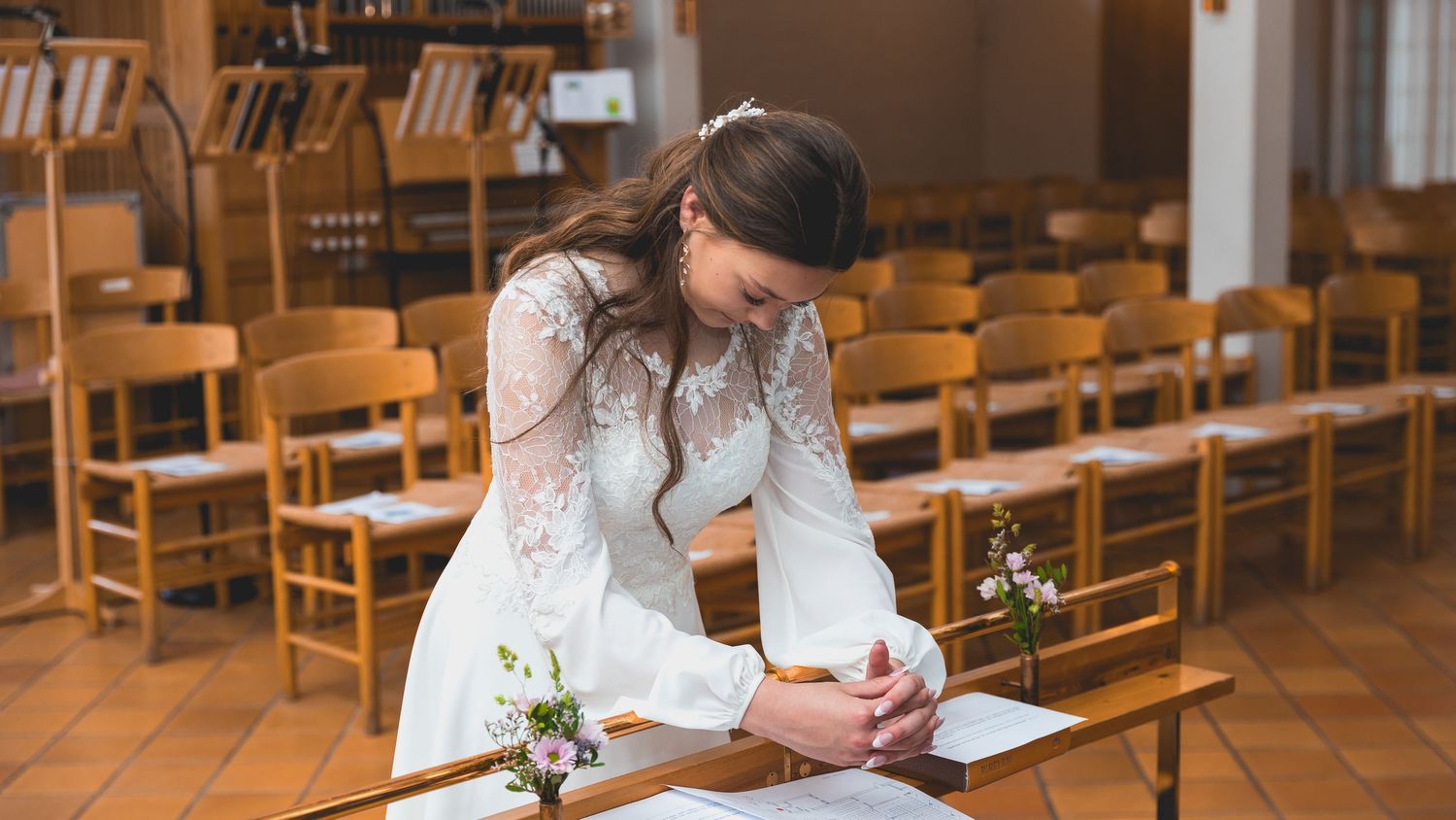 A teenager prays Confirmation