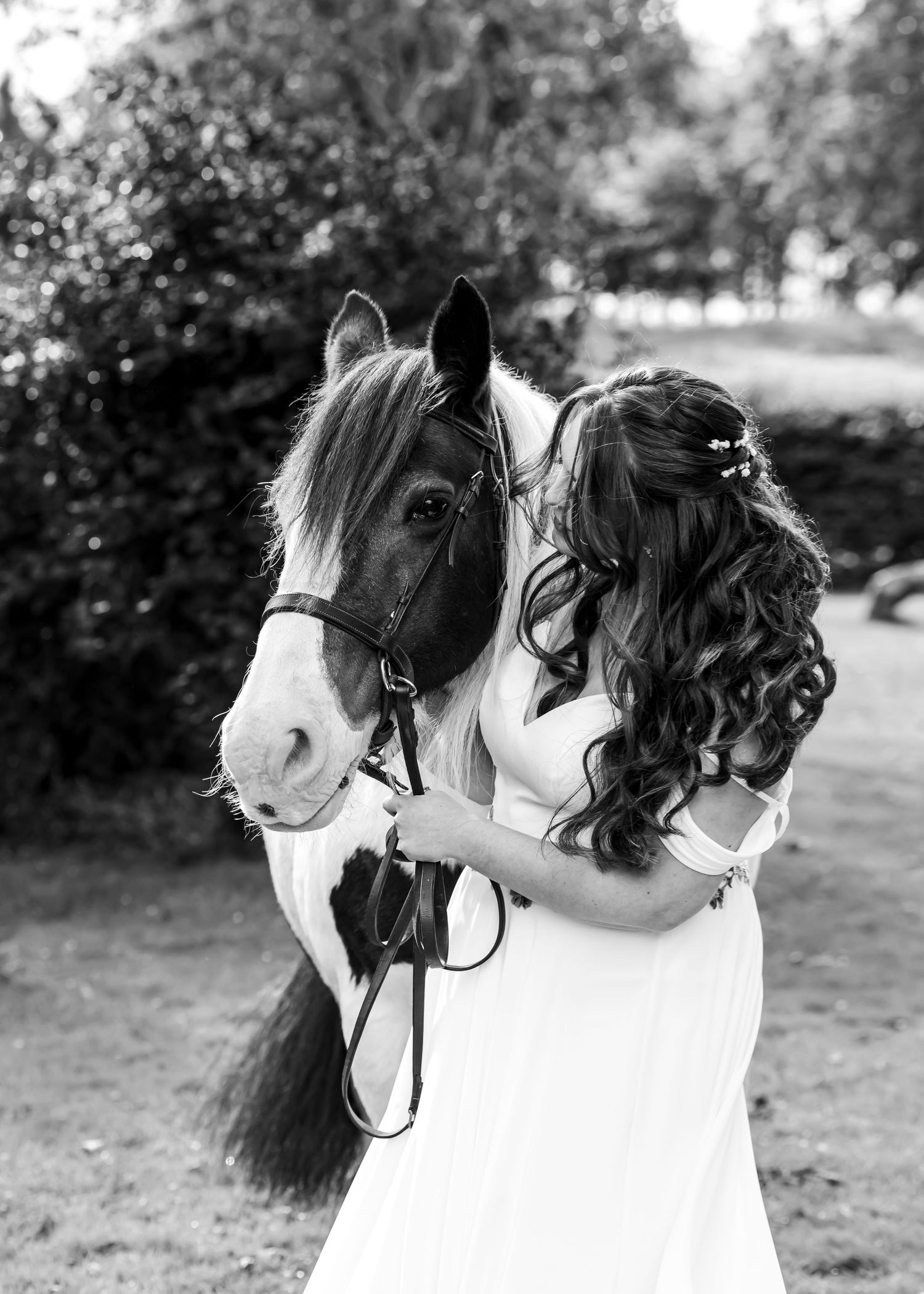 Cumbria wedding photographer - bride and horse portrait