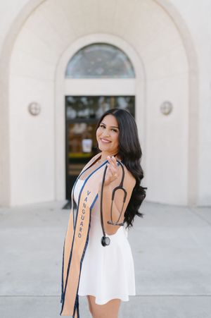 Vanguard University graduate from Nursing school posing for grad photos class of 2026