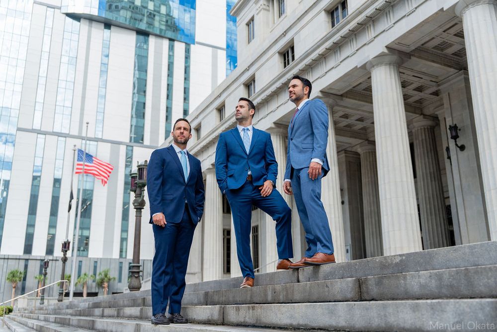 Business team portrait outside the Miami-Dade Courthouse in Downtown Miami, highlighting confidence, leadership, and professionalism.