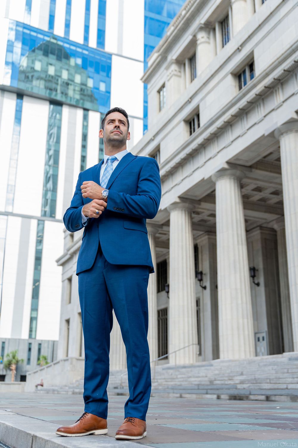 Executive portrait outside the Miami-Dade Courthouse in Downtown Miami, showcasing confidence, leadership, and professionalism.