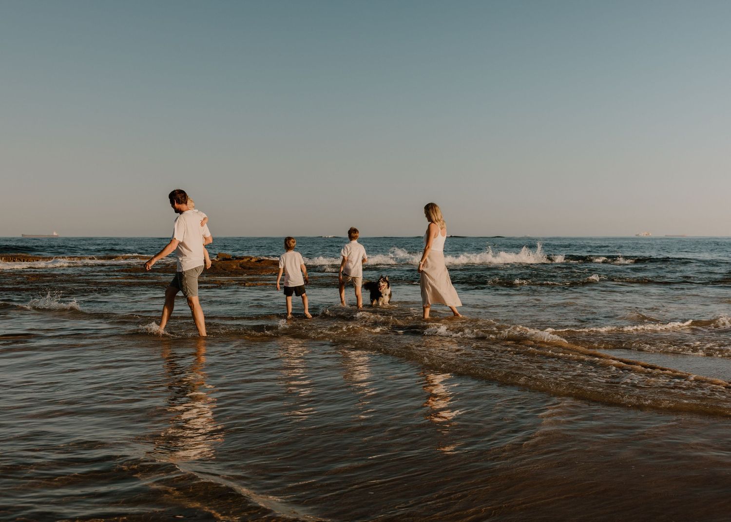 Golden sunset family photos at Corrimal Beach, Candid moments of love and laughter for great value by Lovers and Bubs Photography, Illawarra