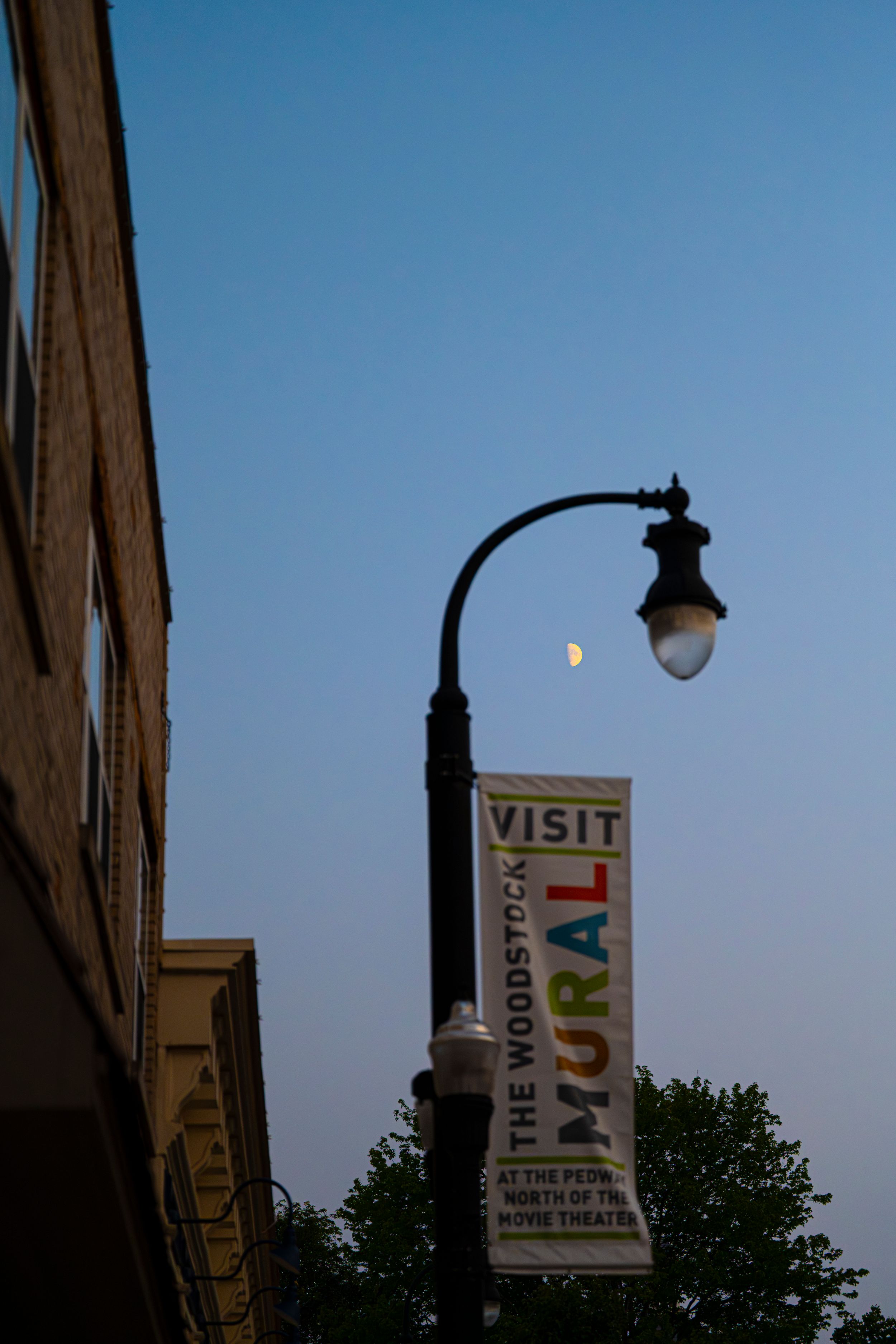 I didn't have my 600mm lens for this or a tripod other than my arms but just had to snap this one... being a lover of the moon and all.