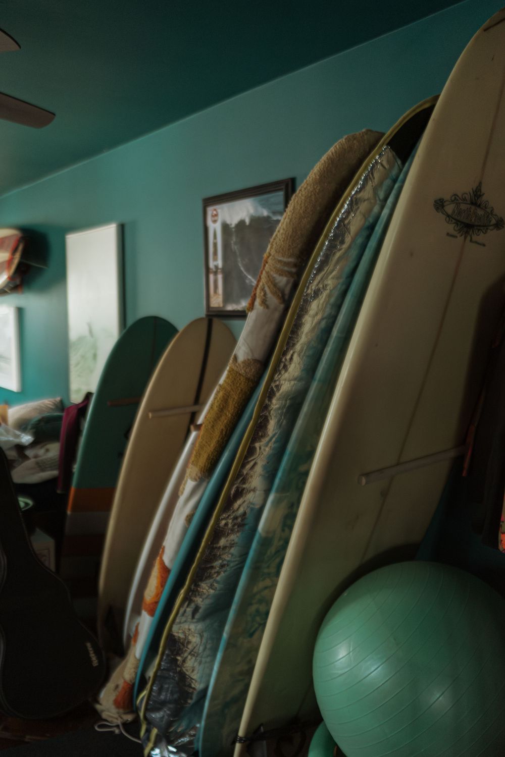 a stack of surfboards