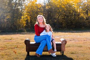 A series of autumn photos on a wooden bench with golden trees and fallen leaves in the background.