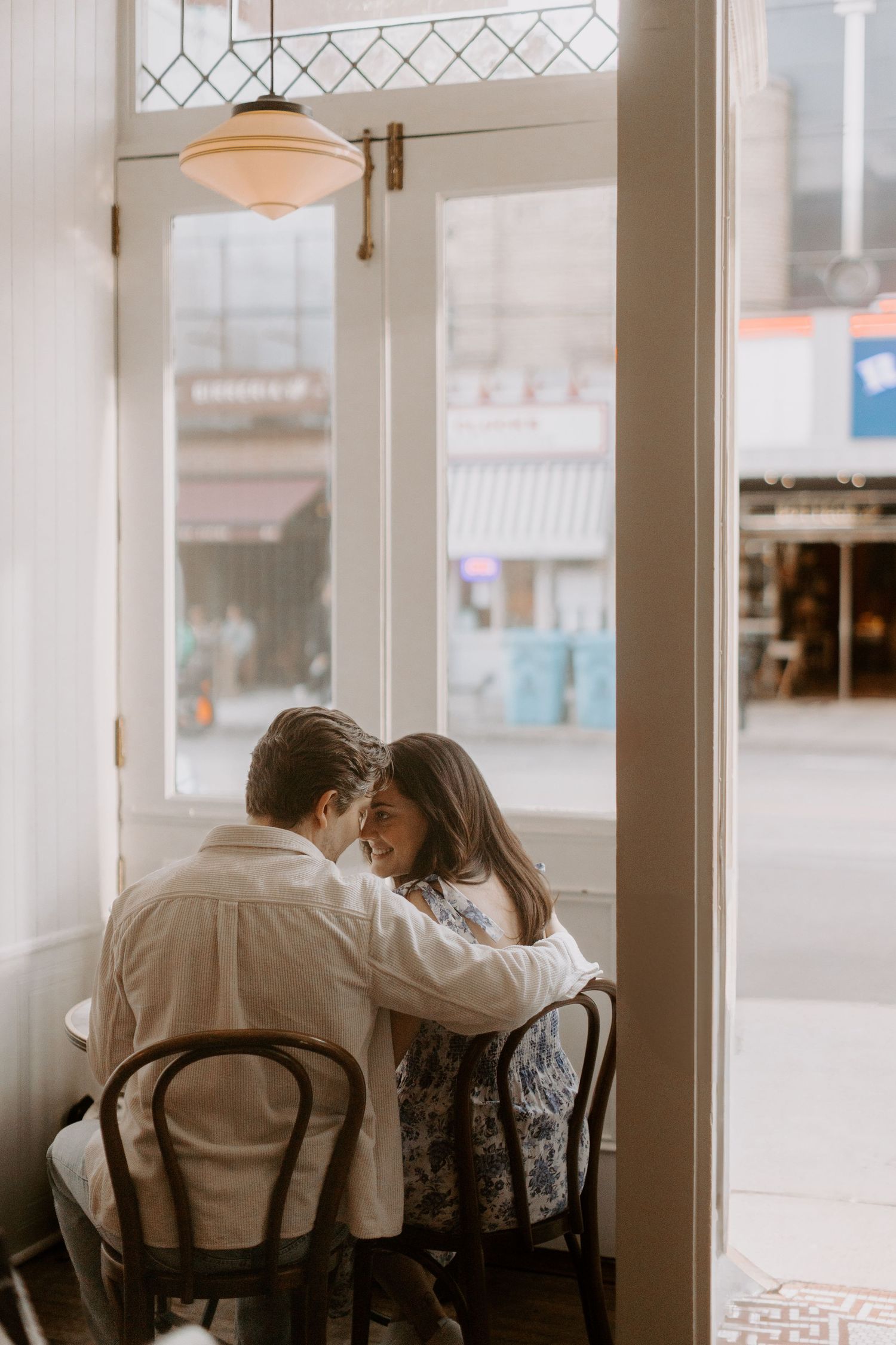 A candid city engagement session photography on College West St in Toronto