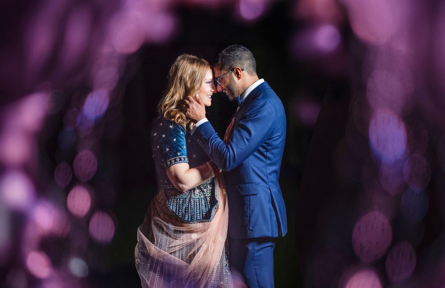 night portrait elegant couple posing for a photo