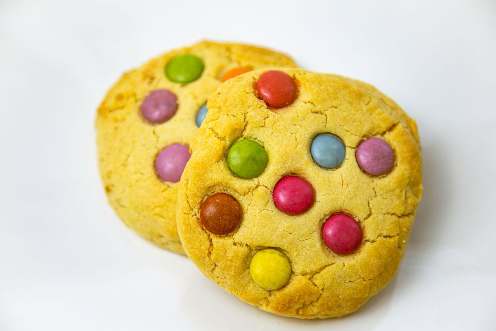 Cinematic product shot of MNM cookies, 2025