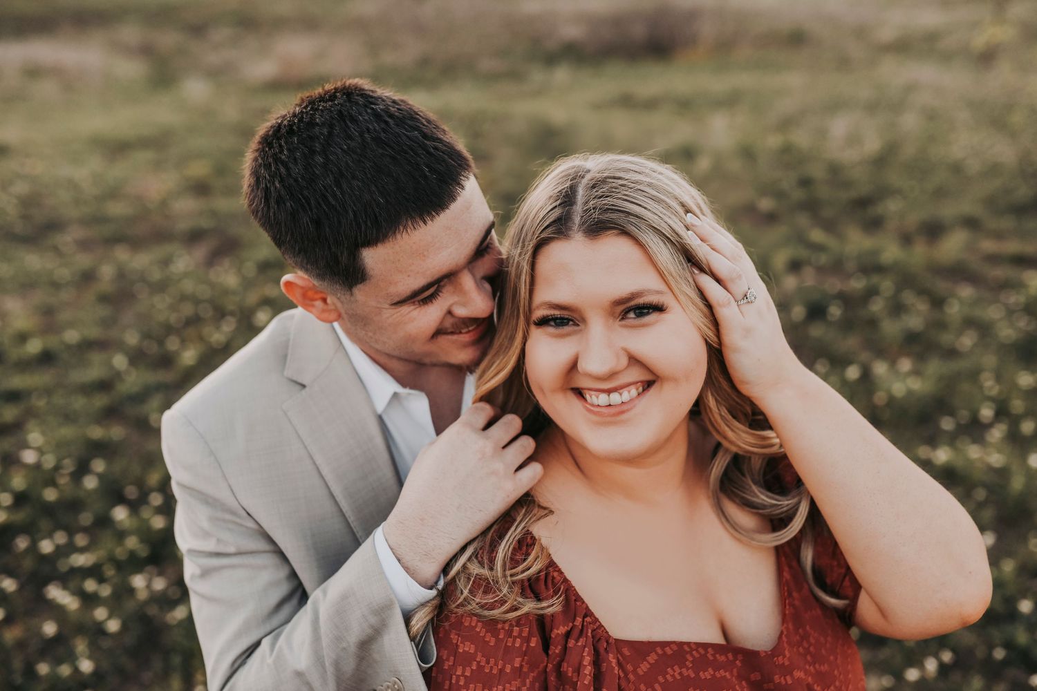 Murrell Park engagement session with scenic sunset and tall grass.