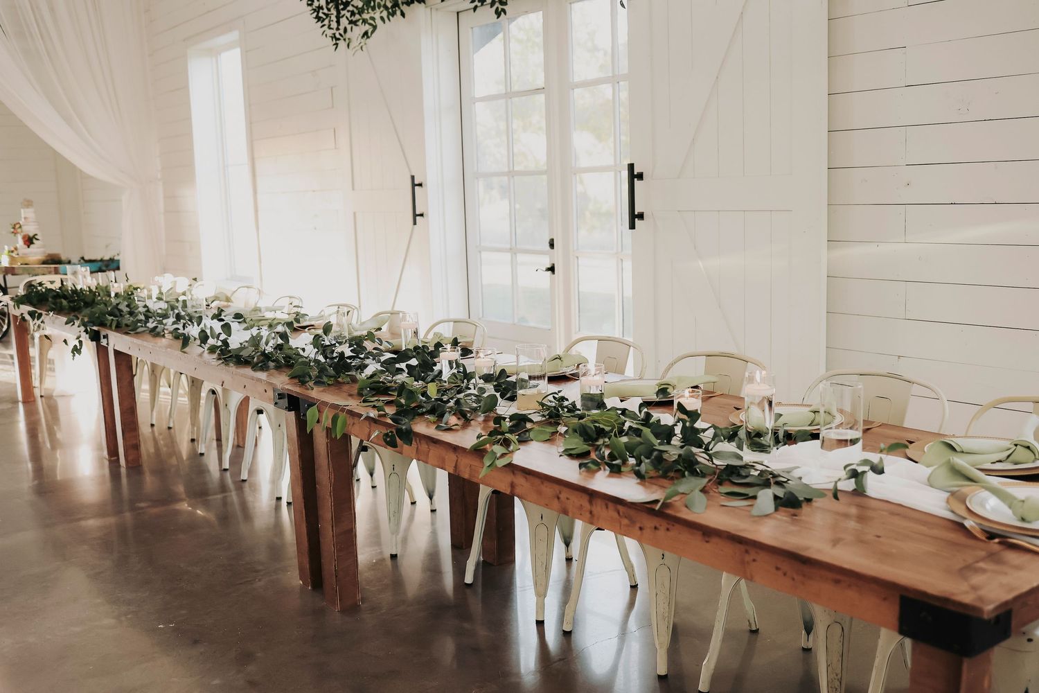 Barn wedding reception photographed by April Pinto Photography