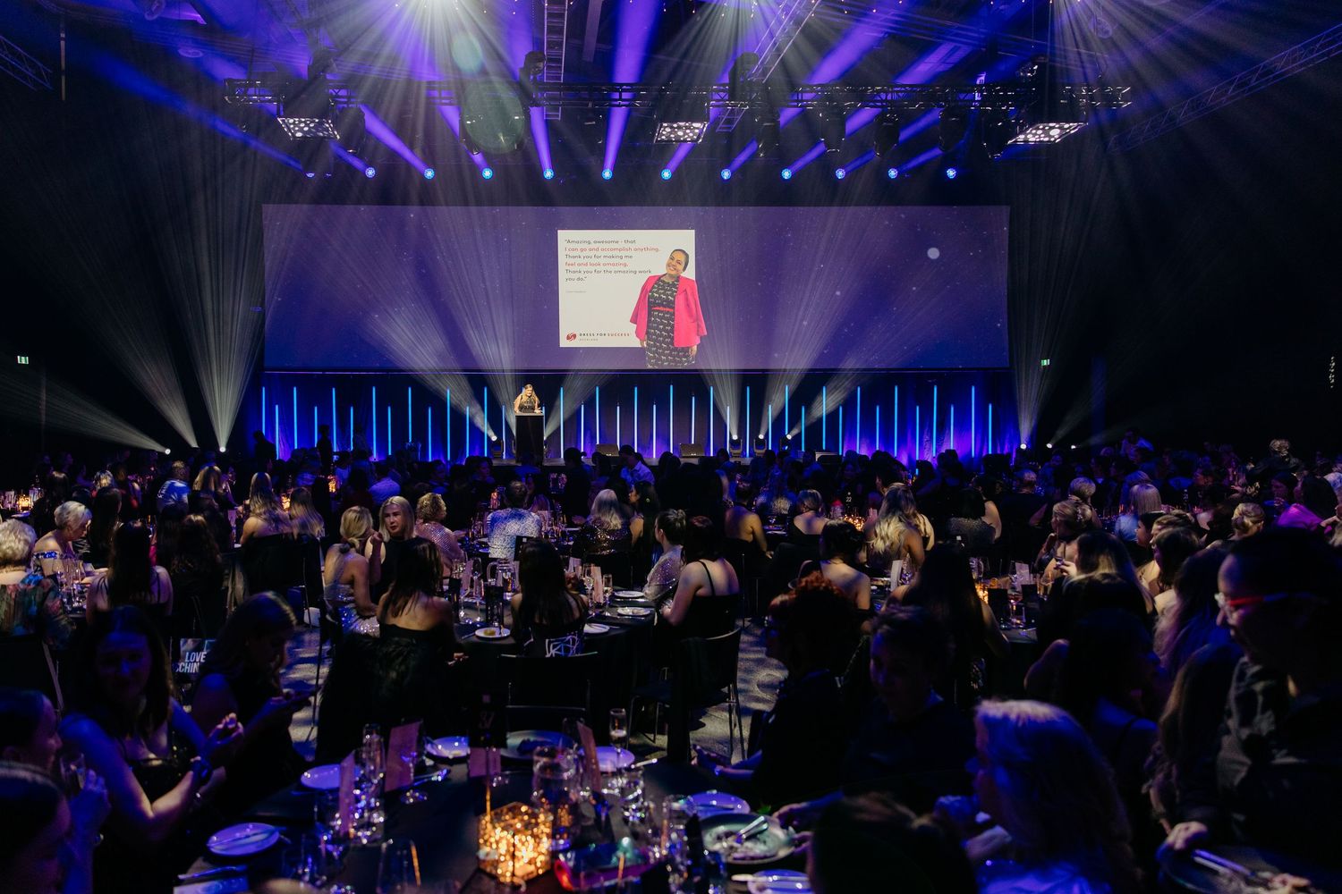 Wide shot of guests gathered at Auckland corporate function