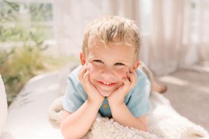 A collage of five candid lifestyle photos showing playful moments and joyful expressions in natural lighting.