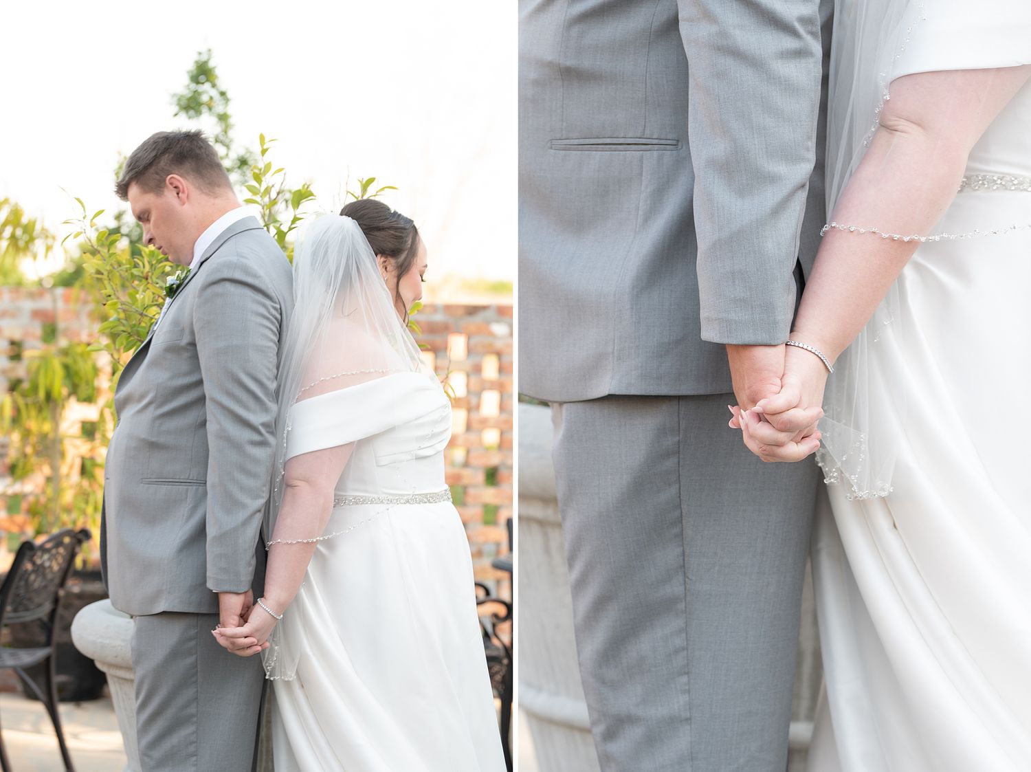 Bride and groom holding hands during outdoor wedding ceremony, wearing white gown and gray suit.