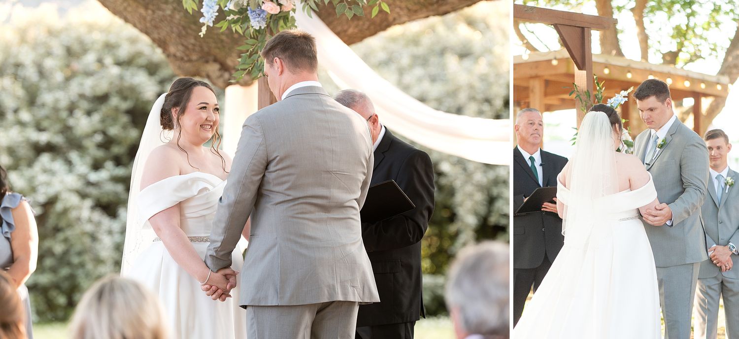 Bride and groom hold hands at outdoor wedding ceremony beneath a tree with white fabric draping.