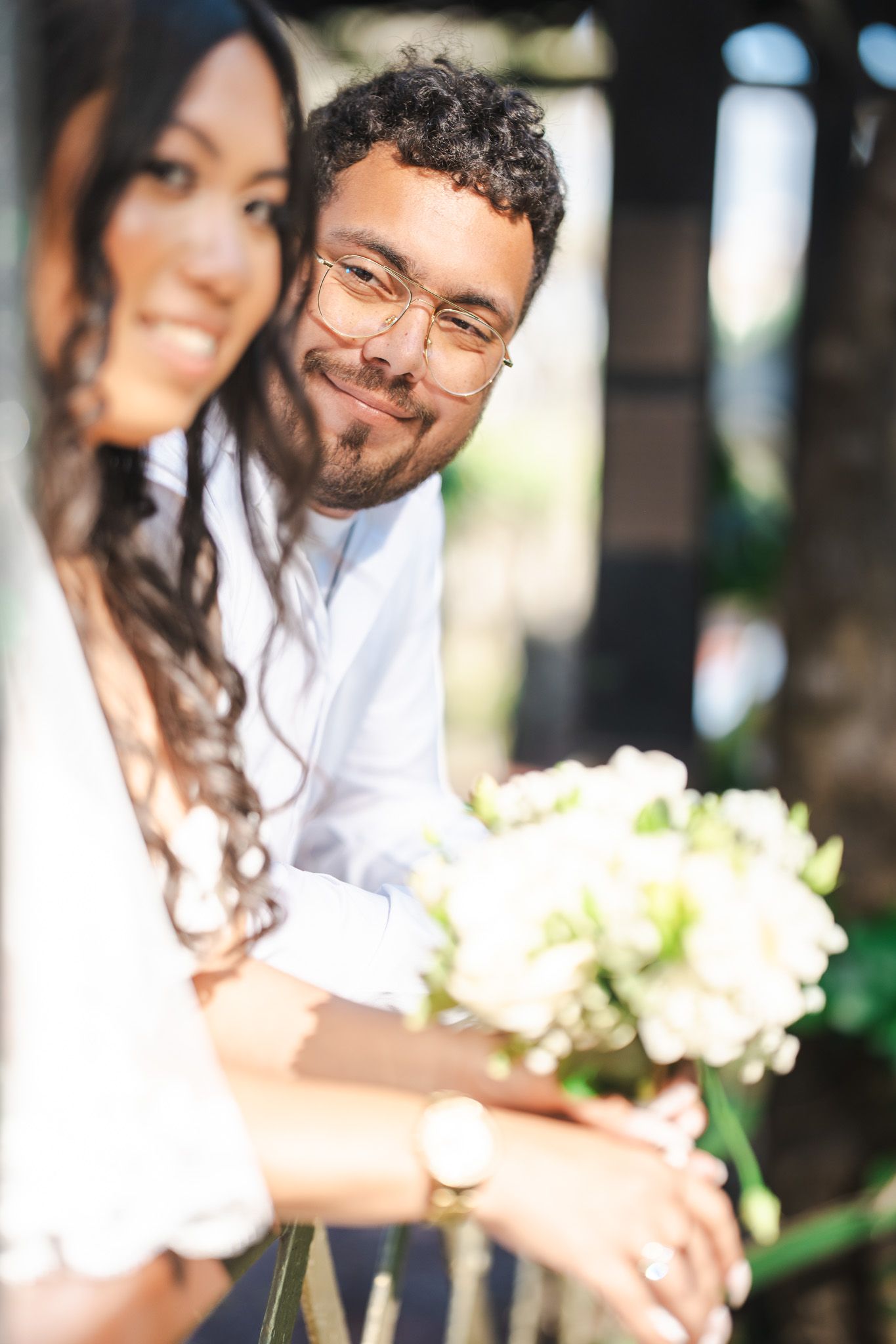 Groom smiles at Bride after wedding day in the botanical Gardens Gibraltar
