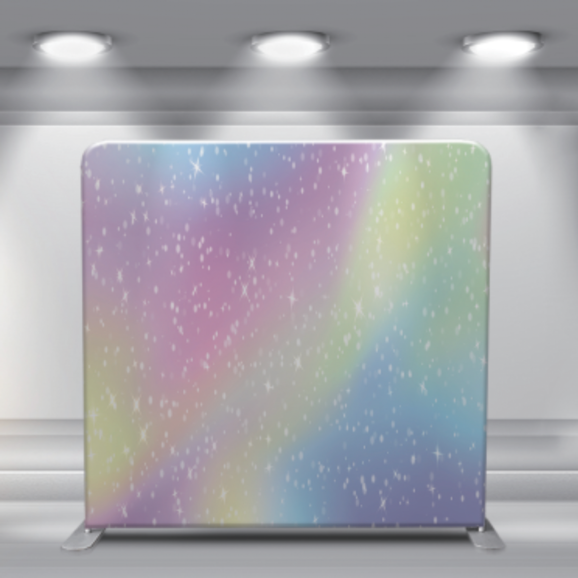Dreamy pastel rainbow backdrop with sparkling starry effect under spotlights.