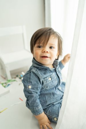 Denim shirt outfit shown against clean white studio background.