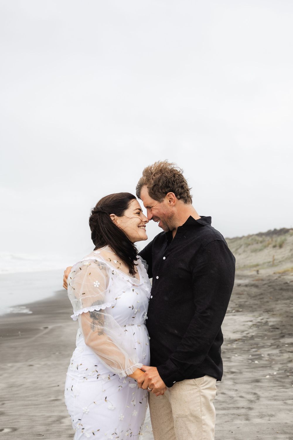 Wedding portait at the beach during a cyclone.