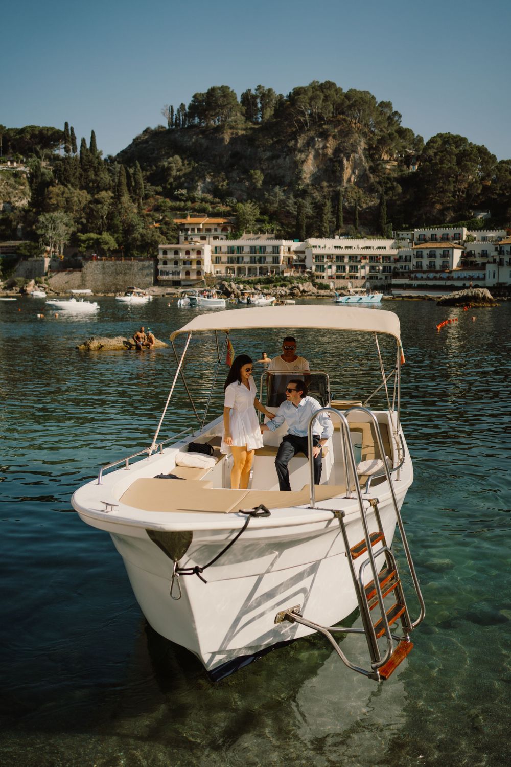 Couple having a boat ride in Taormina, Sicily