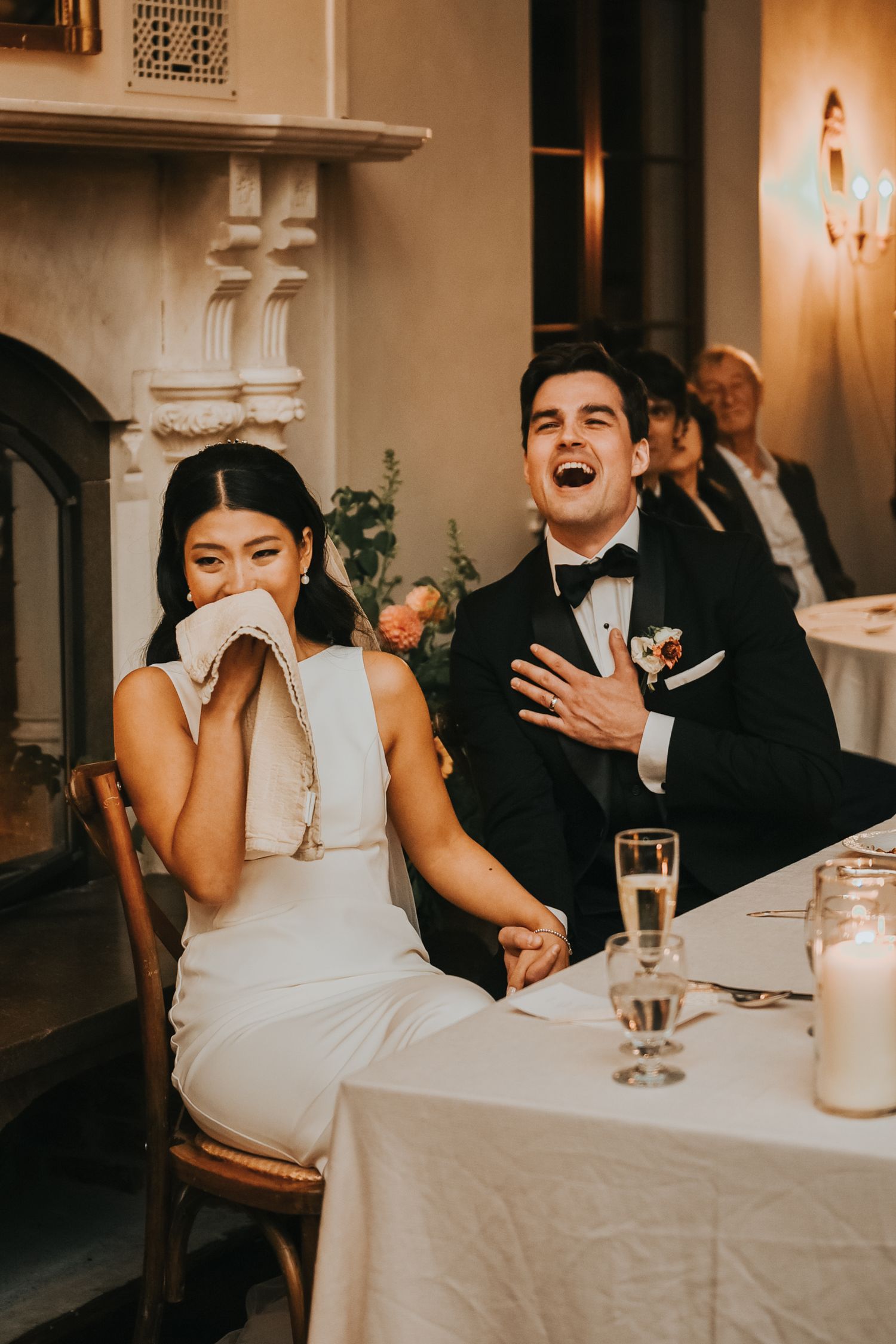 Candid sequence of intimate moments during a wedding reception showing laughter and joy at an elegantly decorated table.