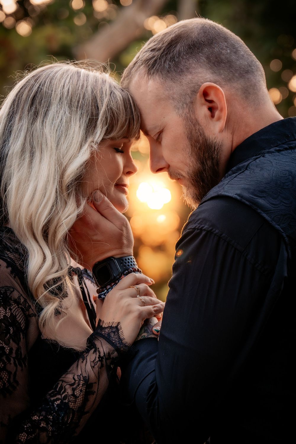 Romantic couple shares intimate moments at sunset with bokeh lights creating a dreamy atmosphere in series of photos.