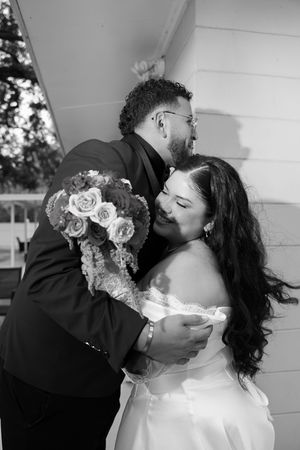 A romantic black and white wedding photo sequence showing a couple sharing tender kisses with roses in the bride's hair.