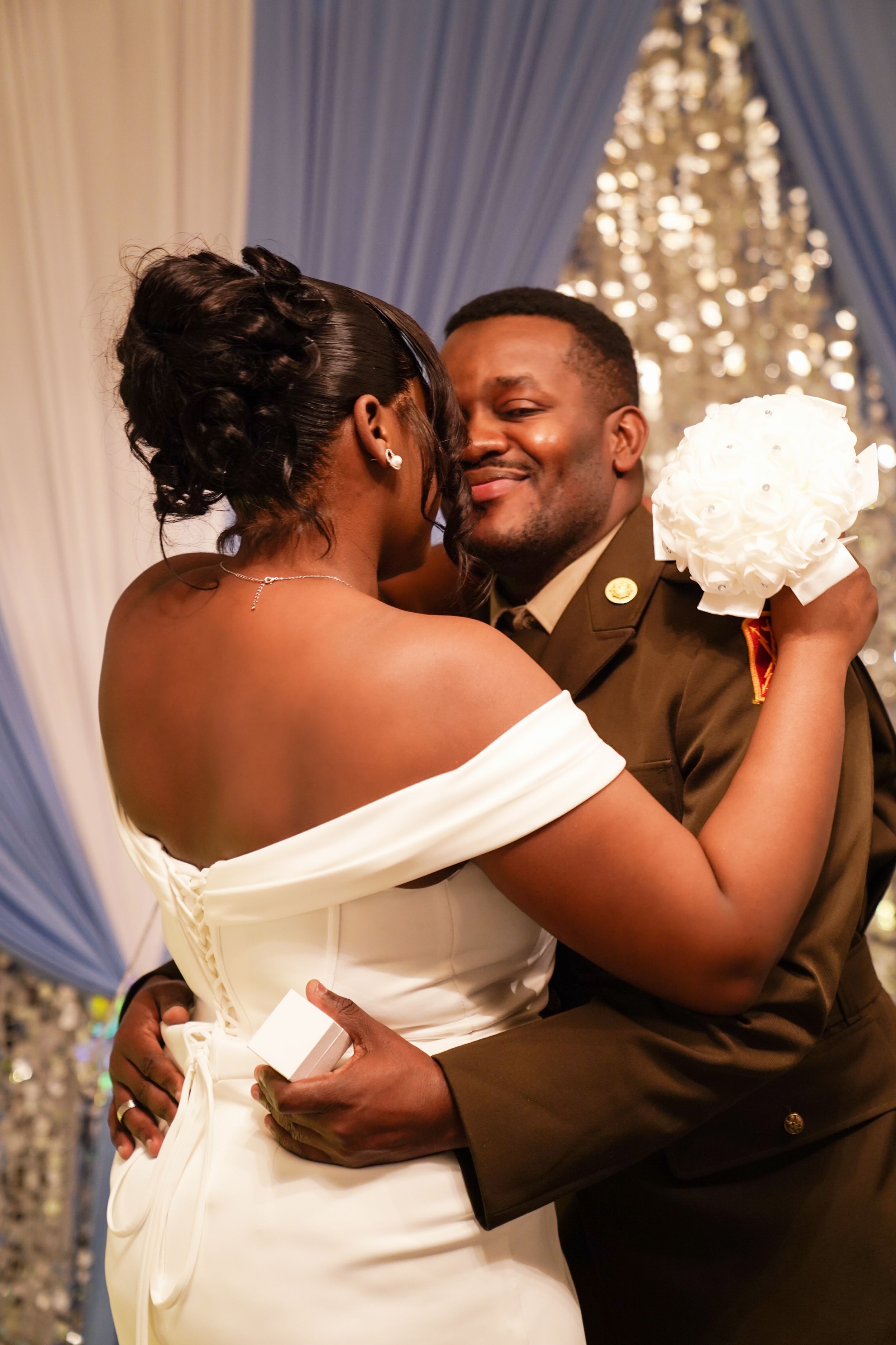 A series of wedding photos showing a couple in formal attire sharing an intimate dance moment under crystal chandeliers.
