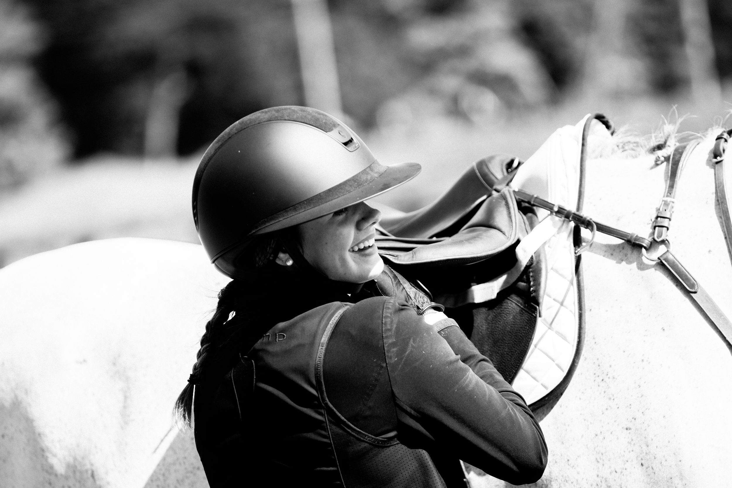 Monochromatic side profile view of military personnel wearing helmets in black and white photography.