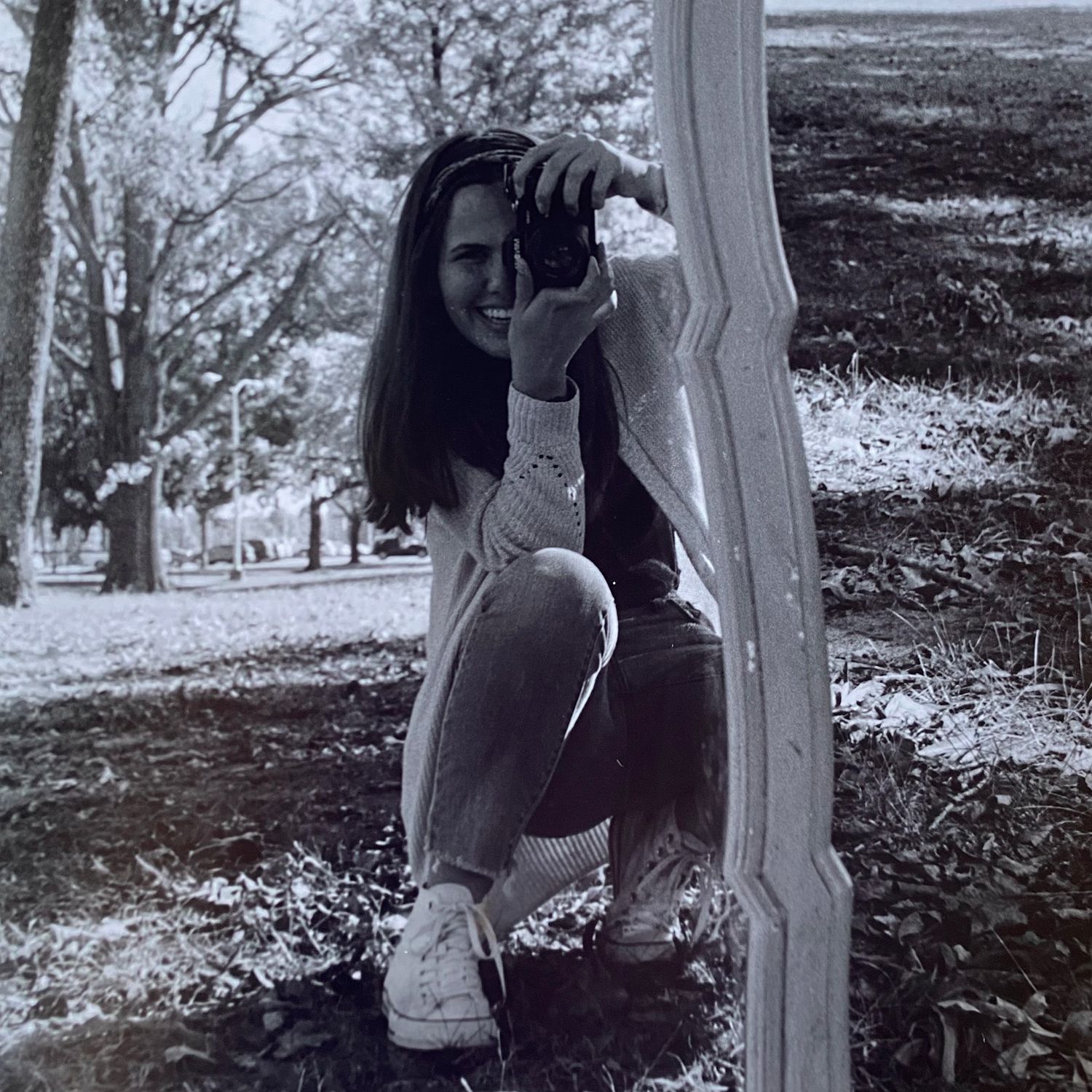 Photographer taking self portrait in mirror