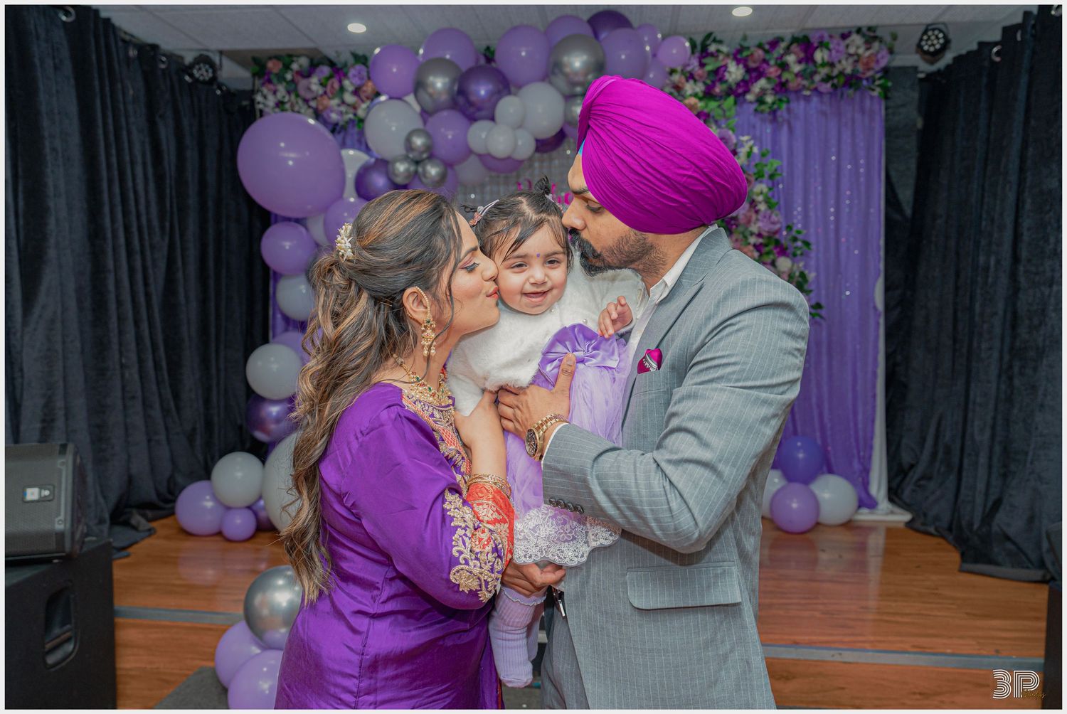 Family members sharing a warm embrace during a family photoshoot, radiating love and togetherness in a beautiful outdoor setting