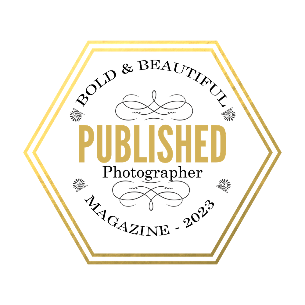 Bold & Beautiful Magazine 2023 Published Photographer badge with gold hexagon border and elegant decorative design.