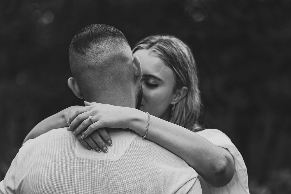 Black and white intimate portrait series showing tender moments between a couple.