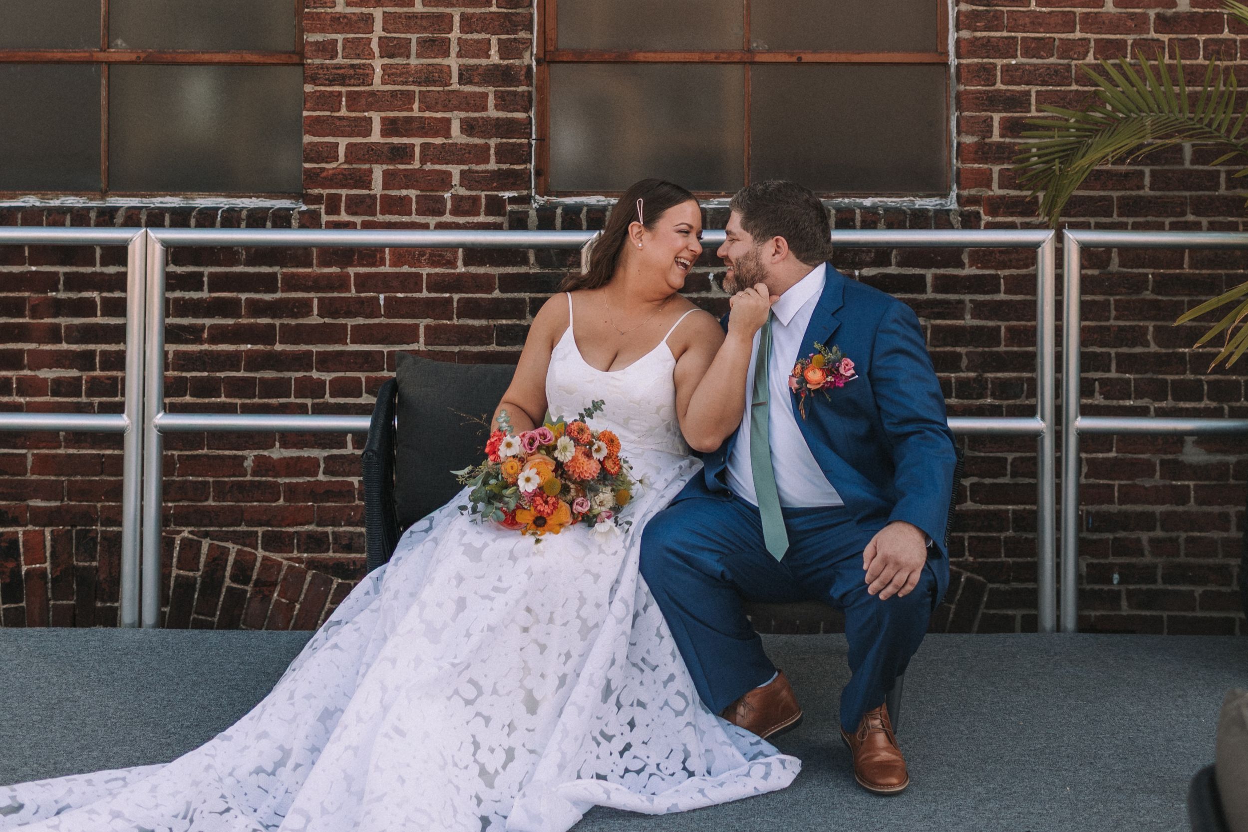 Multiple wedding photos showing a couple posing near a brick building with matching footwear.