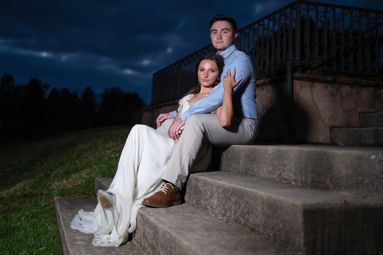elegant couple pose for an engagement session