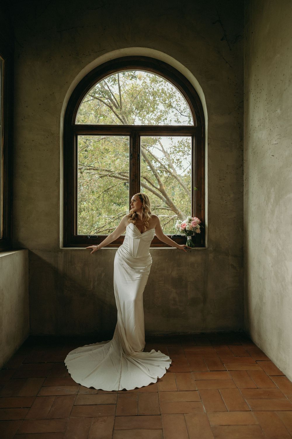 Bride portrait by window at Summerour Studio in Atlanta, Georgia