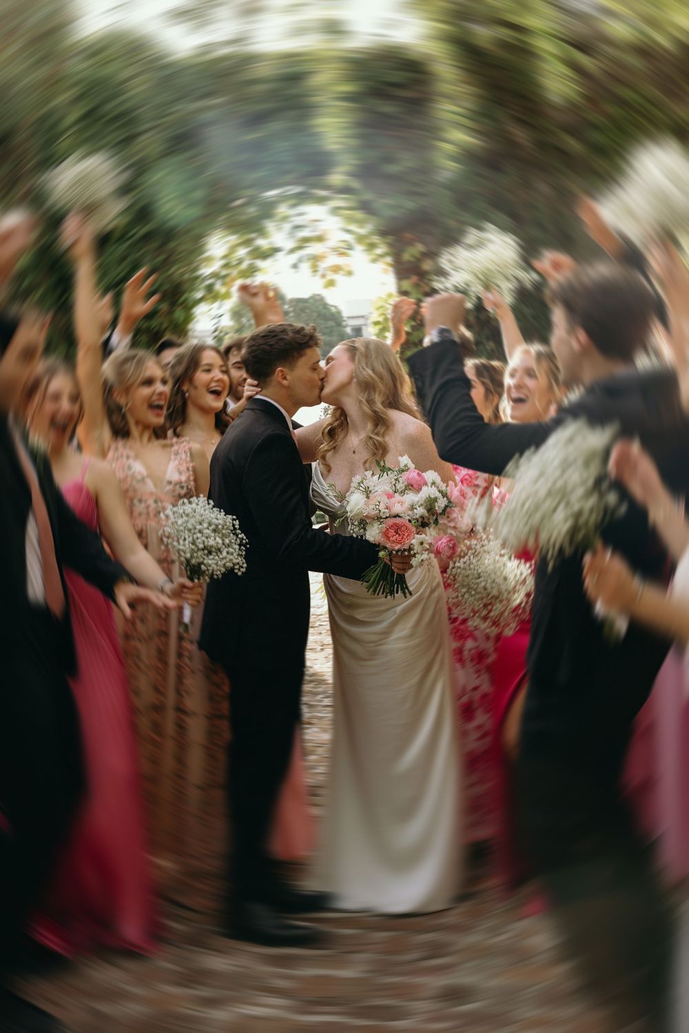 Motion-blur wedding party portrait at Summerour Studio in Atlanta, Georgia