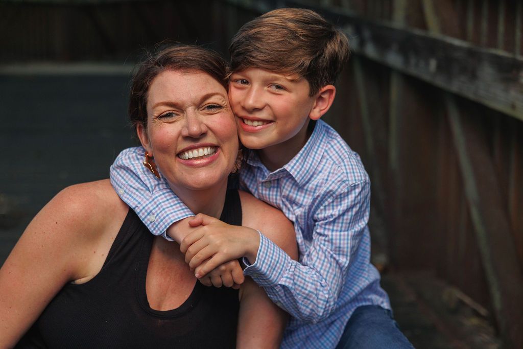 A series of five candid photos showing joyful embraces and laughter between two people outdoors.