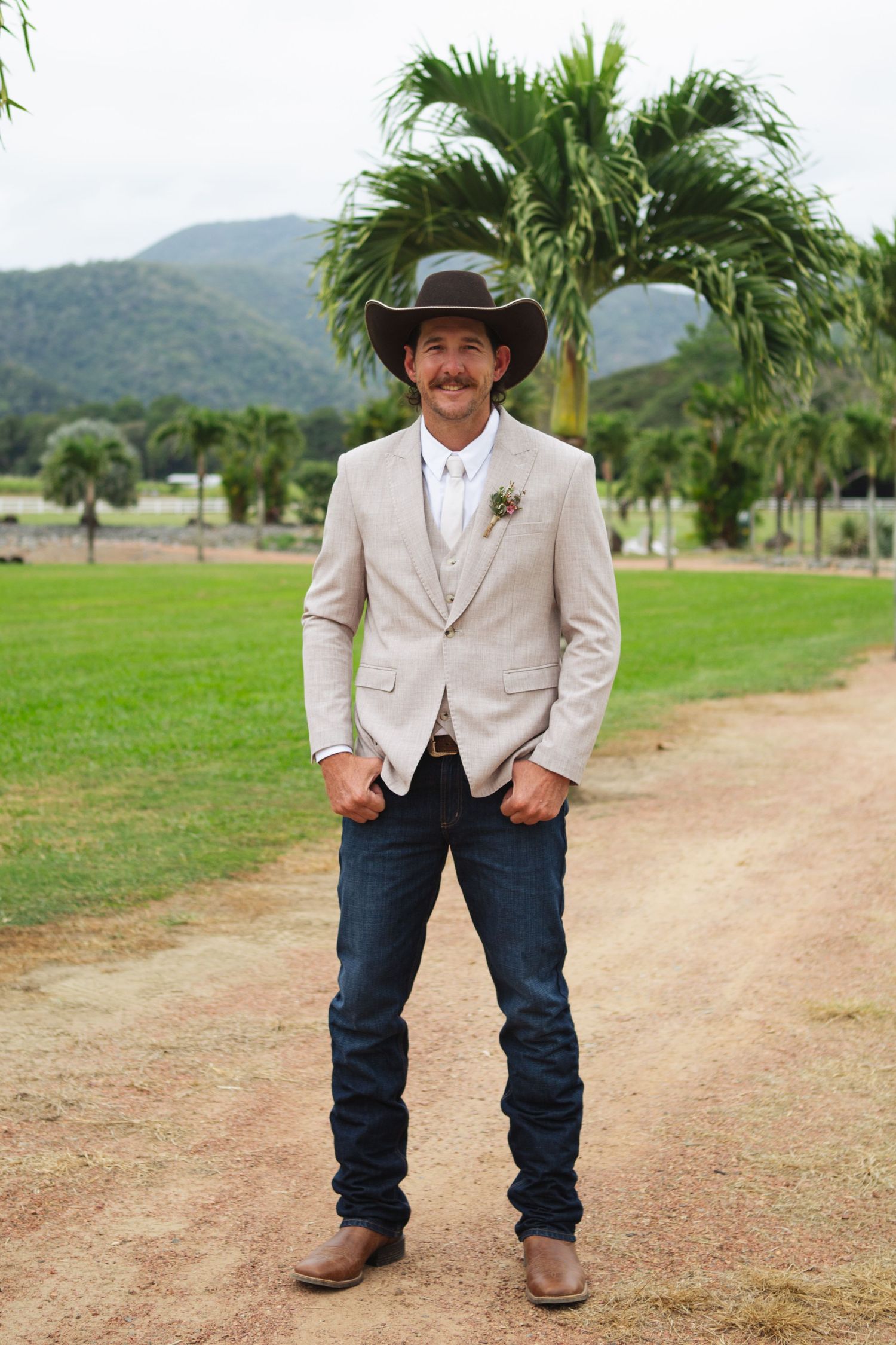 Groom smiling at Port Douglas country wedding