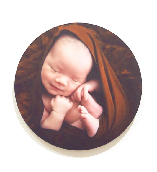 Series of close-up photographs showing sleeping baby details in warm brown tones.