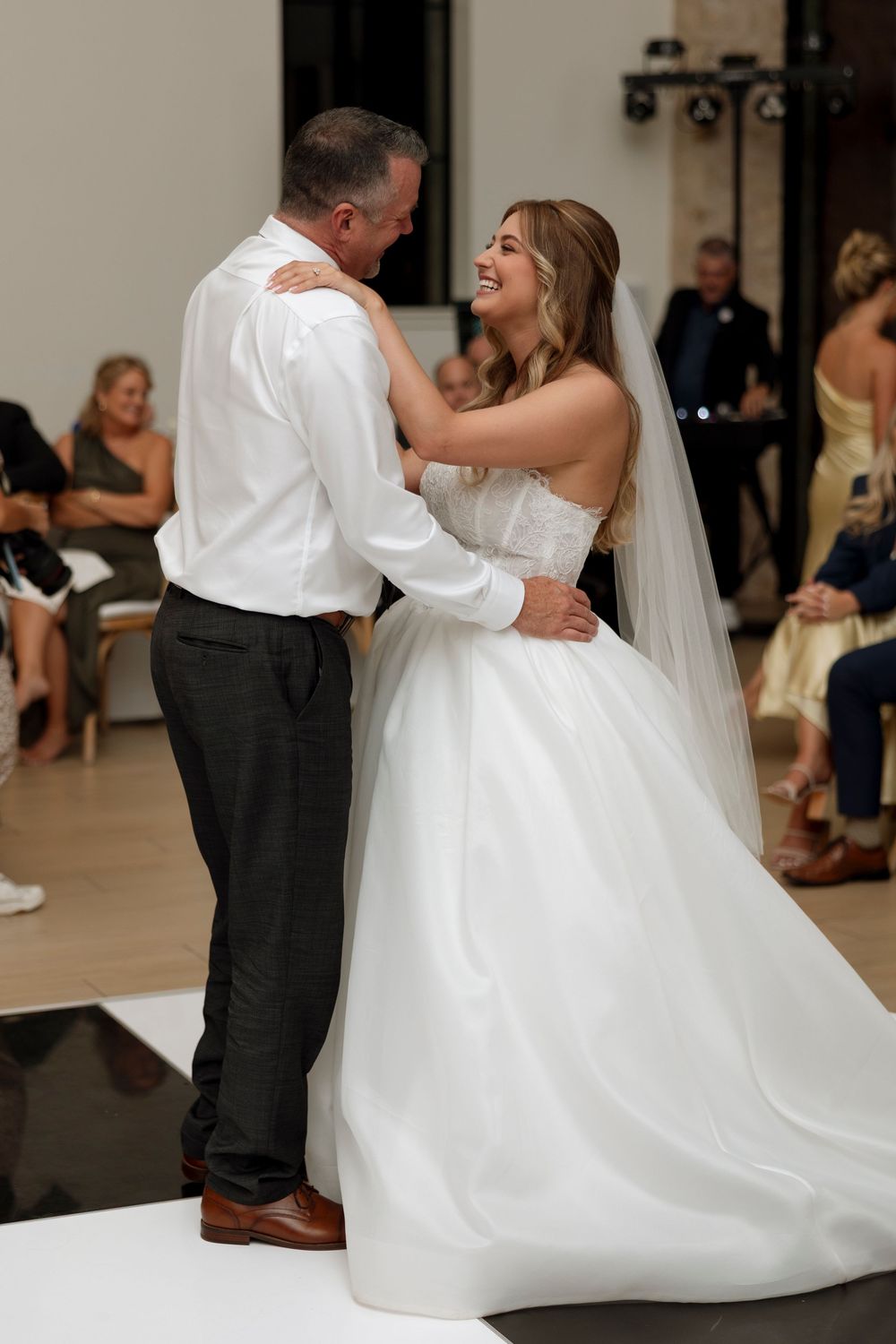 A series of romantic wedding dance photos showing a couple in formal attire performing a dip move on the dance floor.