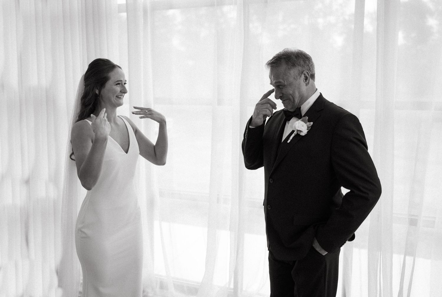 Black and white candid emotional moment between two people.