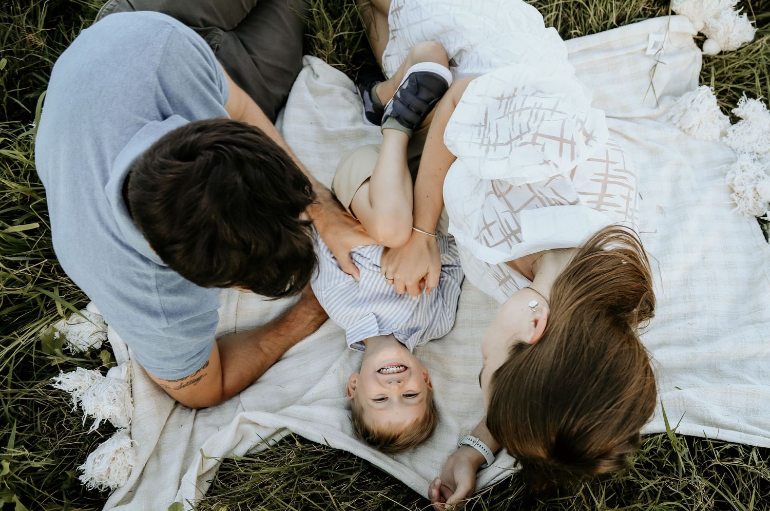 Tickles and smiles for this little man during his family session