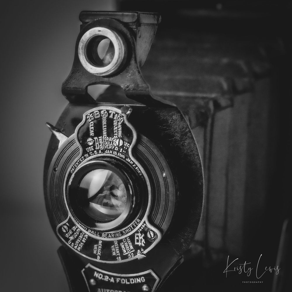 Professional product photo. Black and white image of a vintage camera. captured with studio lighting in Blackwood, South Wales