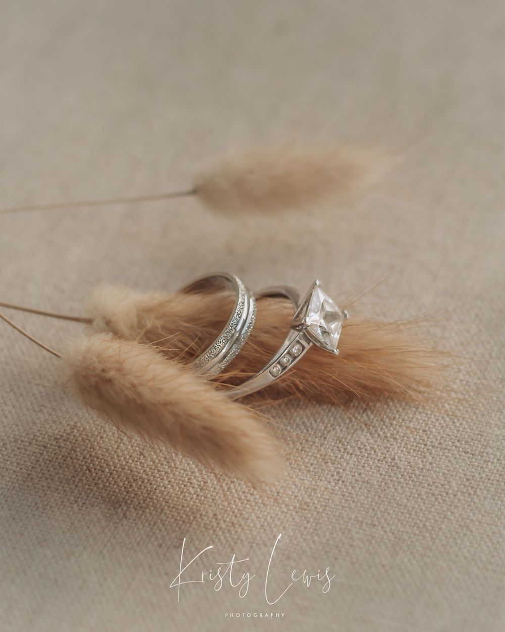 Professional product photo of wedding and engagement ring on dried flower shot in studio in Blackwood, south Wales by K Lewis Photography