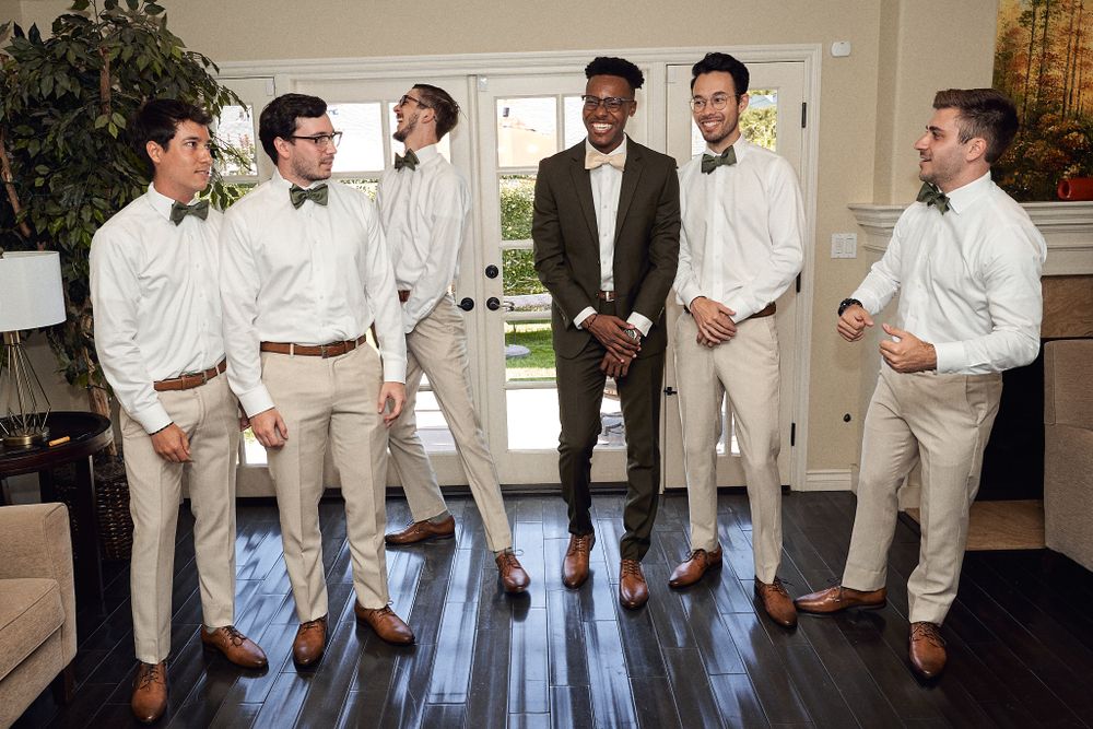 Group photo of groomsmen and groom after getting ready at home in Southern California