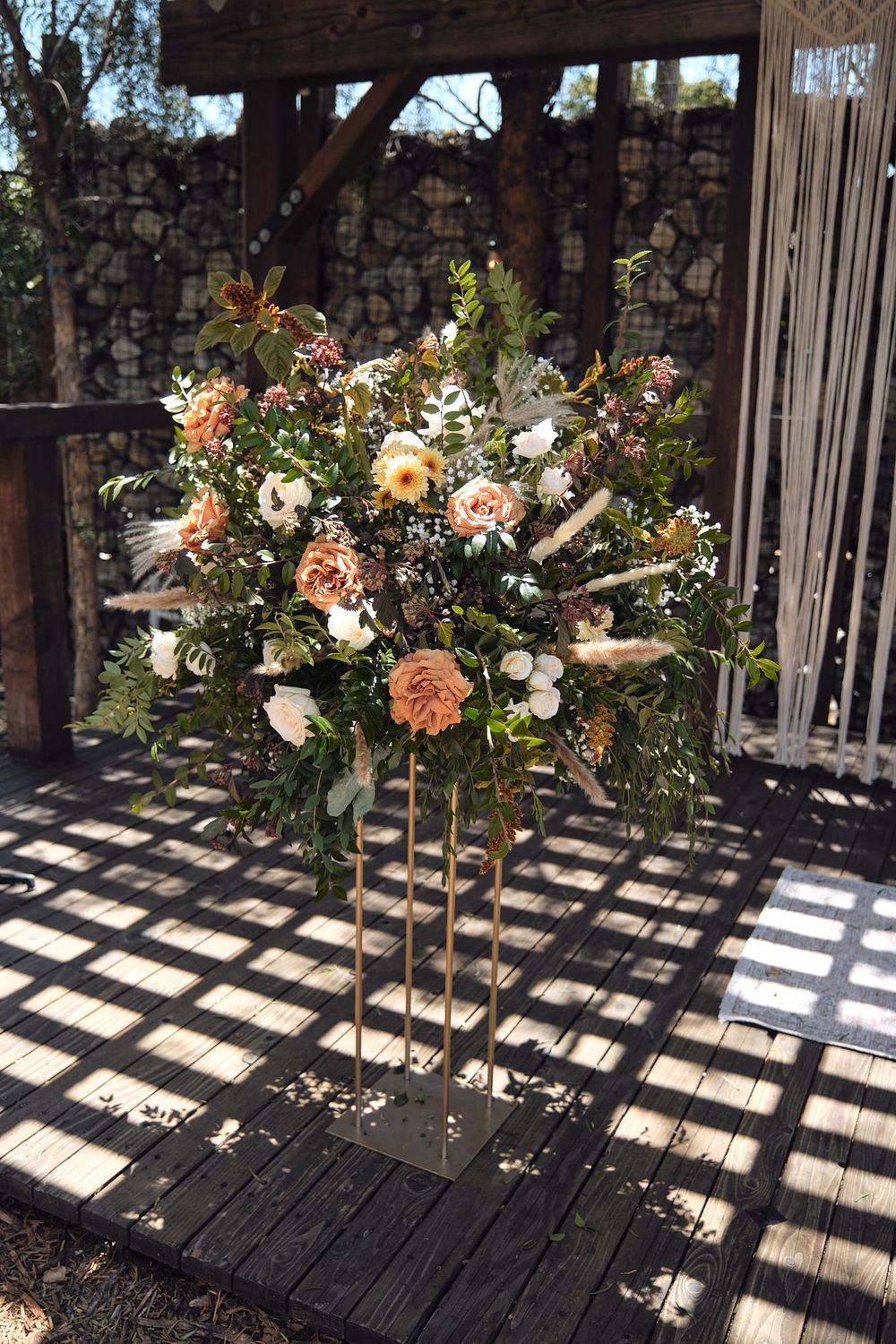 Large floral arrangement for wedding ceremony at the Riverbed Farm in Anaheim, California