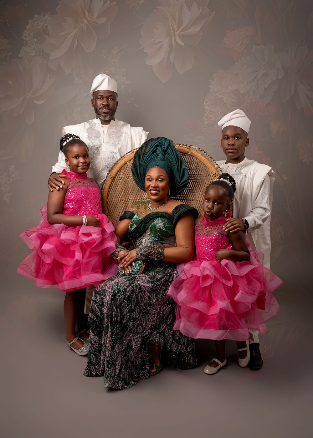 A family portrait series showing a group in coordinated outfits with a young child in a pink tulle dress against a studio backdrop.